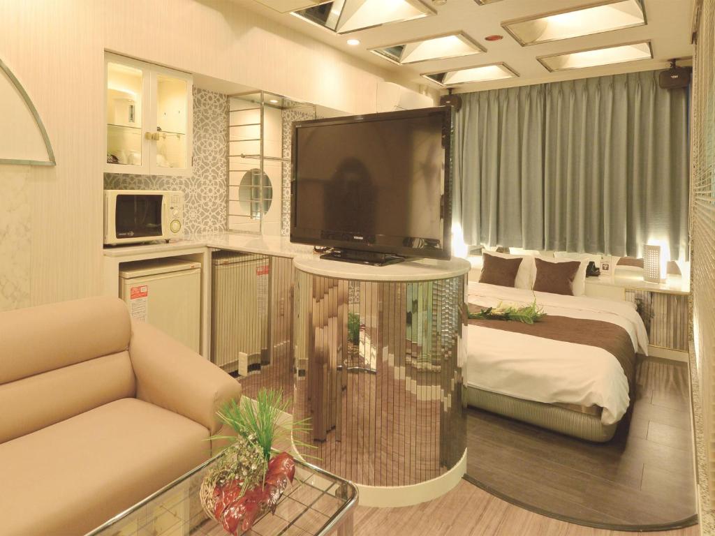 Postel nebo postele na pokoji v ubytování HOTEL CHANT - Adult Only 大人専用