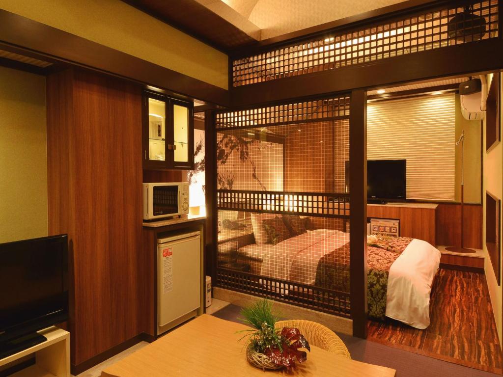 Postel nebo postele na pokoji v ubytování HOTEL CHANT - Adult Only 大人専用