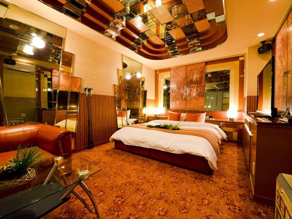 Postel nebo postele na pokoji v ubytování HOTEL CHANT - Adult Only 大人専用