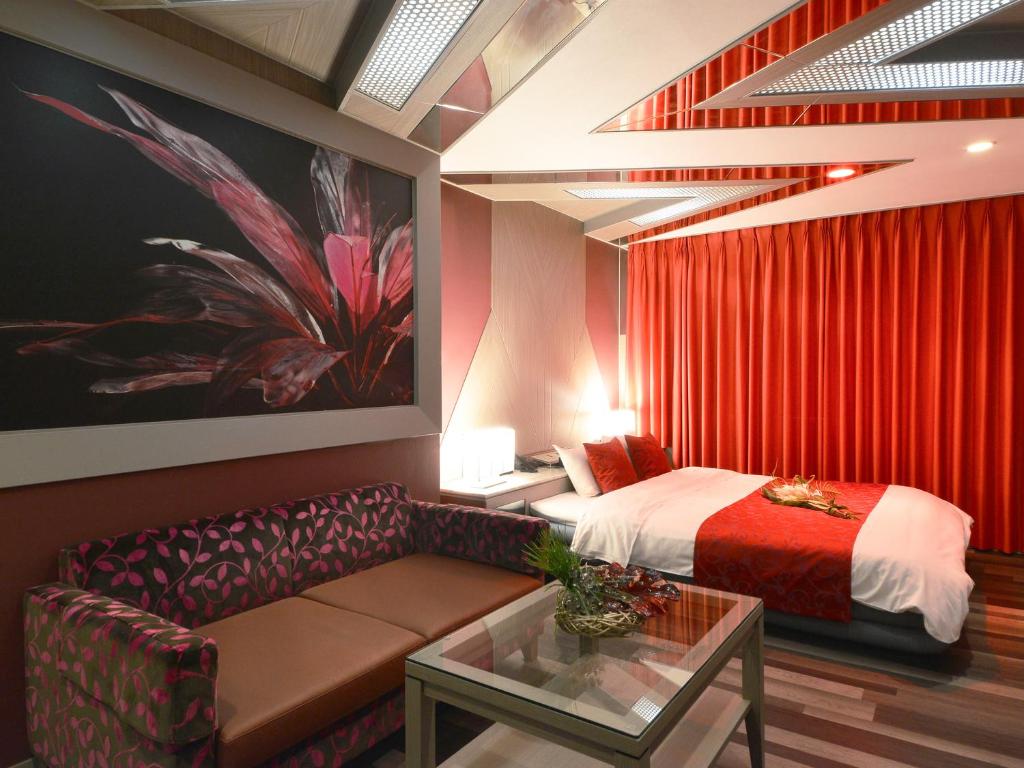 Postel nebo postele na pokoji v ubytování HOTEL CHANT - Adult Only 大人専用