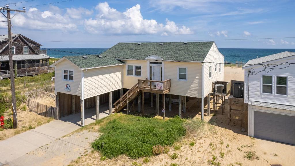 an aerial view of a house on the beach at OCEANFRONT, Ocean views, Dogs Welcome! KH10, Beach House in Kitty Hawk