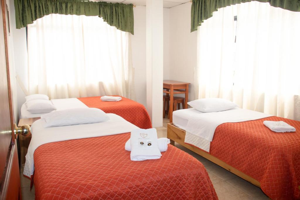 Postel nebo postele na pokoji v ubytování Hotel Colonial