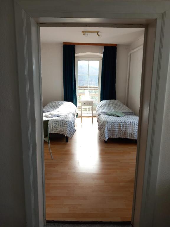Postel nebo postele na pokoji v ubytování Gasthof Feische