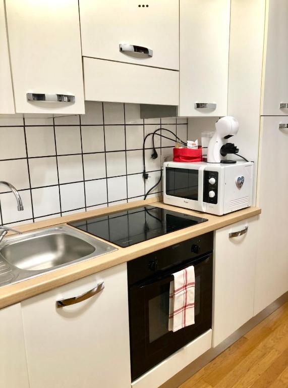 Kuchyň nebo kuchyňský kout v ubytování Corte Da Vinci - Fiera Milano e Milano City