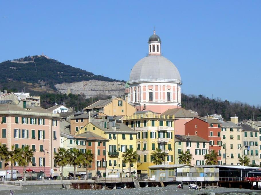 a group of buildings with a building in the background at Casa dei Marinai a Pegli (Citra: 010025-LT-4074) in Genova