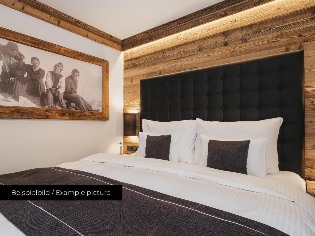 Postel nebo postele na pokoji v ubytování VAYA Seefeld inklusive Seefeld Gästekarte