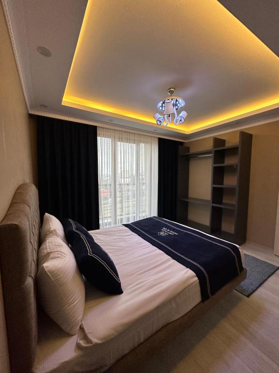 Postel nebo postele na pokoji v ubytování Special House & Private Transportation İstanbul Airport-By Loft