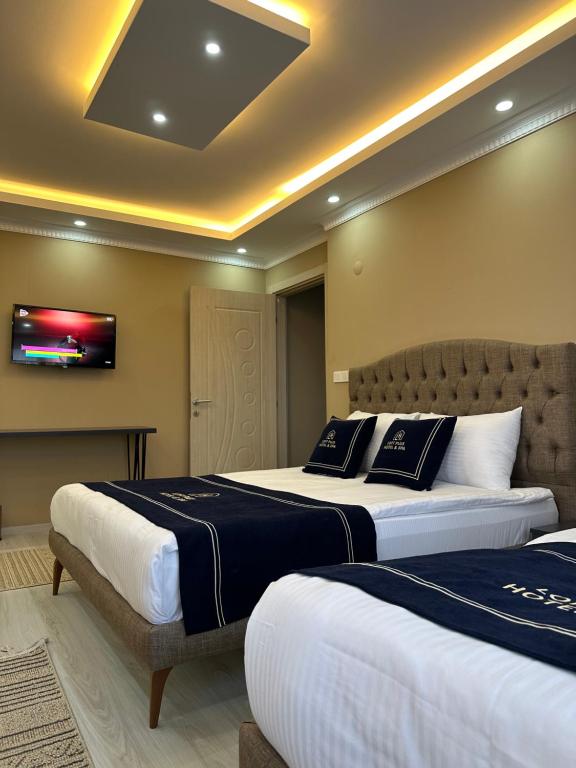 Postel nebo postele na pokoji v ubytování Special House & Private Transportation İstanbul Airport-By Loft