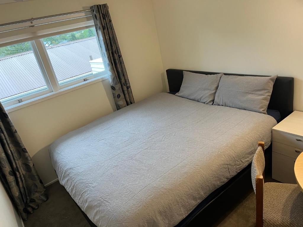 Postel nebo postele na pokoji v ubytování Hillcrest Homestay, NorthShore, Auckland