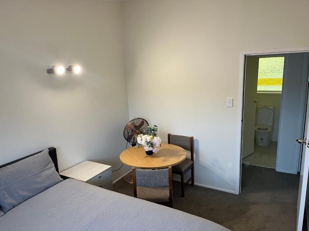 Postel nebo postele na pokoji v ubytování Hillcrest Homestay, NorthShore, Auckland
