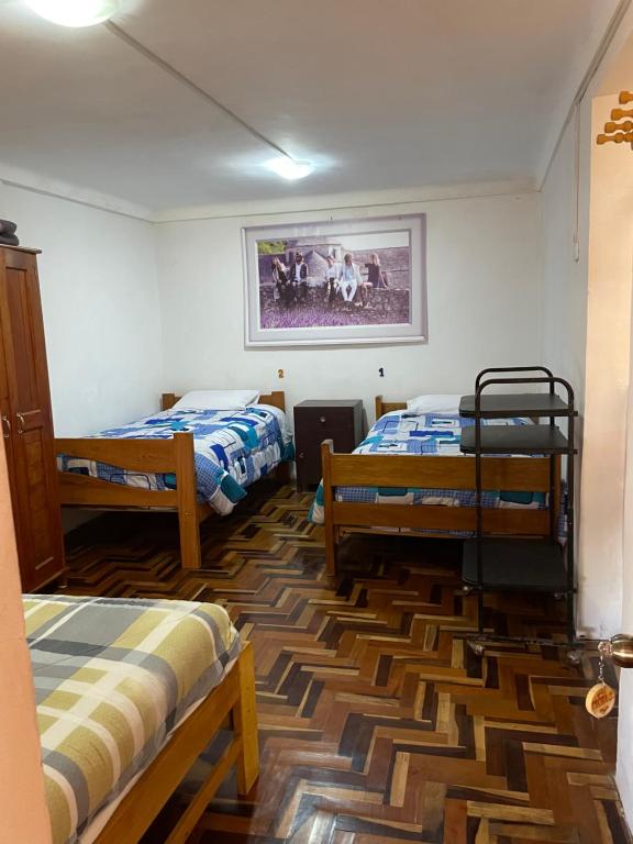 Postel nebo postele na pokoji v ubytování Big Vacation Hostel