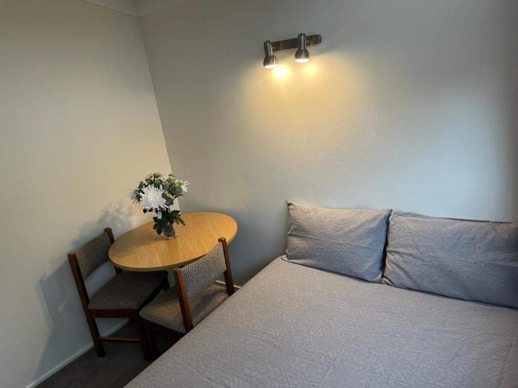 Postel nebo postele na pokoji v ubytování Hillcrest Homestay, NorthShore, Auckland