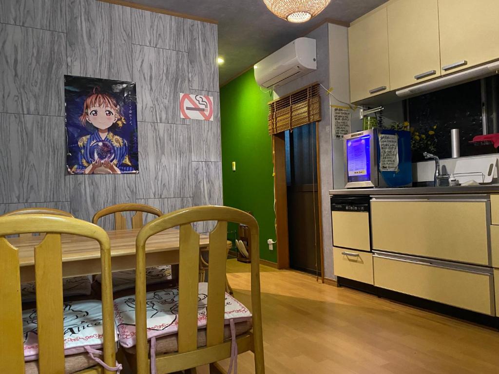 Kuchyň nebo kuchyňský kout v ubytování Numazu Ikyuuan 沼津一休庵