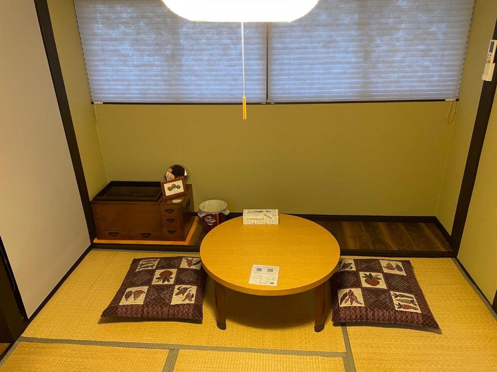 Postel nebo postele na pokoji v ubytování 松本はなれ Matsumoto HANARE - Japanese style private bedroom Guest hause