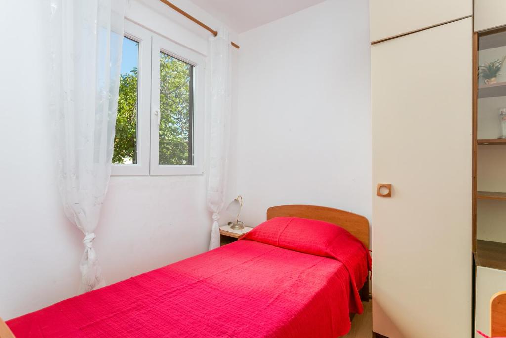 Posteľ alebo postele v izbe v ubytovaní Apartment Seget Vranjica 1038b
