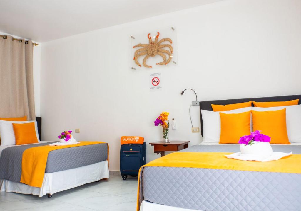 Postel nebo postele na pokoji v ubytování La Zayapa Hotel