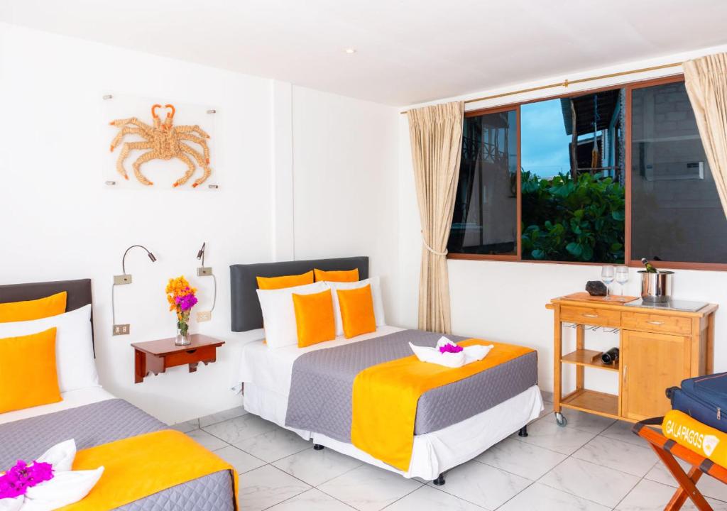 Postel nebo postele na pokoji v ubytování La Zayapa Hotel