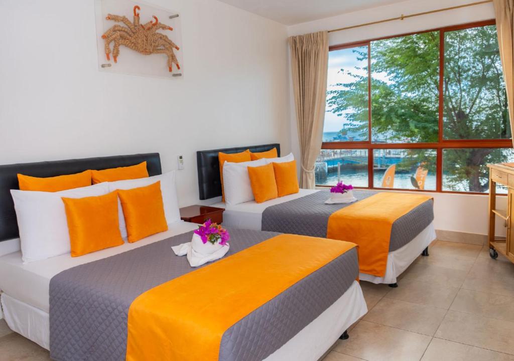 Postel nebo postele na pokoji v ubytování La Zayapa Hotel