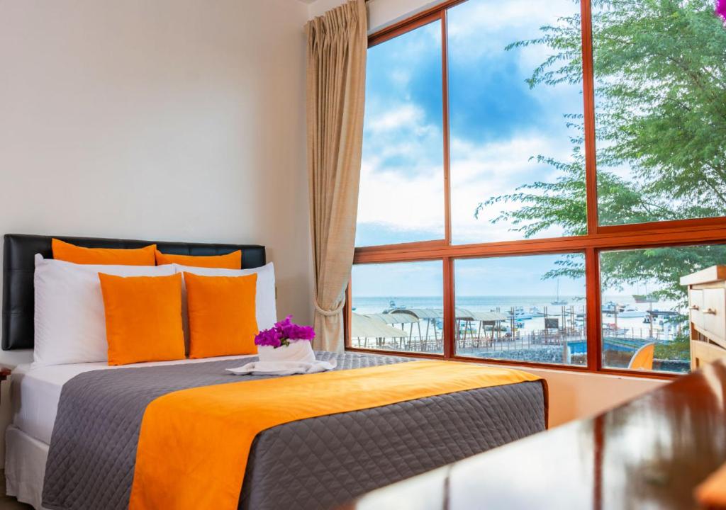 Postel nebo postele na pokoji v ubytování La Zayapa Hotel