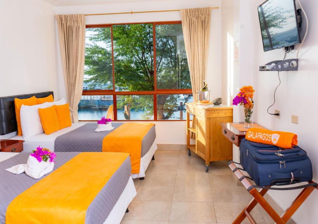 Postel nebo postele na pokoji v ubytování La Zayapa Hotel