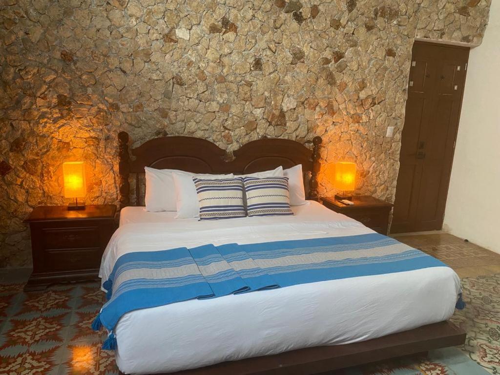 Postel nebo postele na pokoji v ubytování Boutique Casa Azuli Santiago
