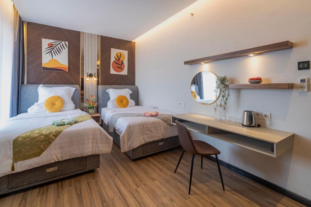 Postel nebo postele na pokoji v ubytování Stay.vie Hotel