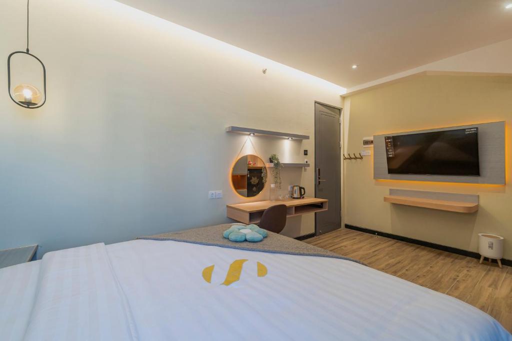 Postel nebo postele na pokoji v ubytování Stay.vie Hotel
