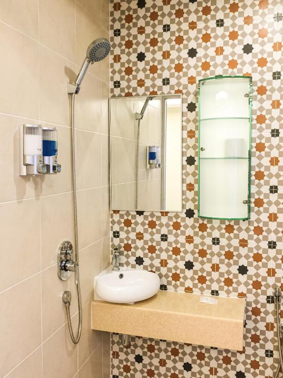 Koupelna v ubytování Louis Hotel