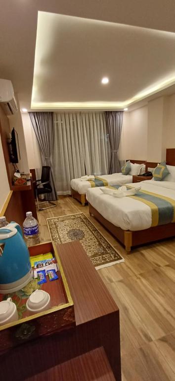 Postel nebo postele na pokoji v ubytování Hotel Yakroo Manang