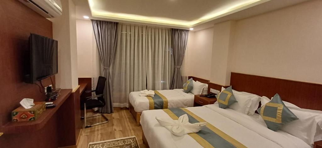 TV a/nebo společenská místnost v ubytování Hotel Yakroo Manang