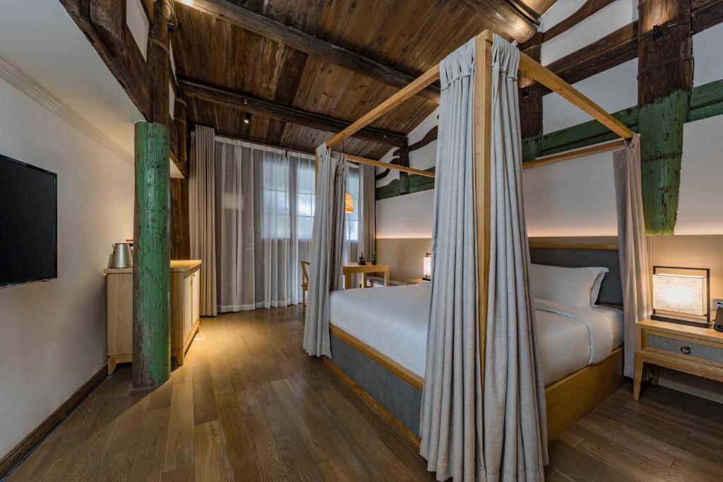 Postel nebo postele na pokoji v ubytování Hangshe Hostel Fuzhou