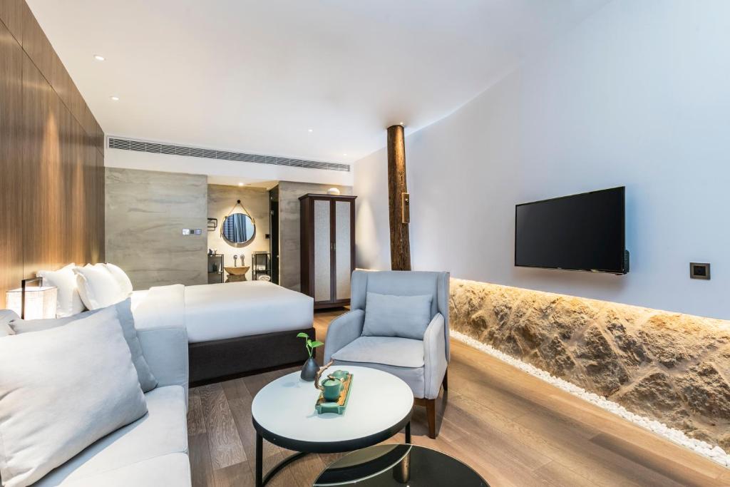 TV a/nebo společenská místnost v ubytování Hangshe Hostel Fuzhou