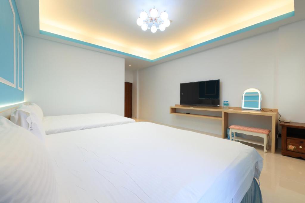 Postel nebo postele na pokoji v ubytování Sunshine B&B