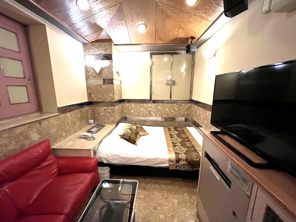 TV a/nebo společenská místnost v ubytování Hotel Crystal -adult only-