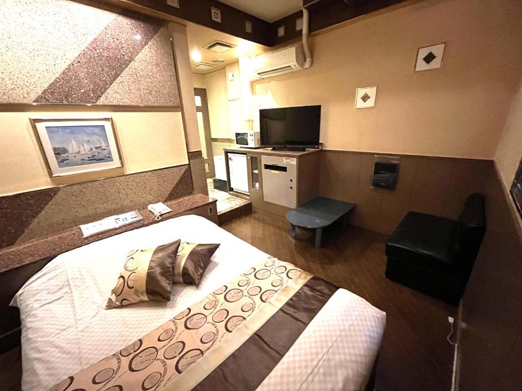 Postel nebo postele na pokoji v ubytování Hotel Crystal -adult only-