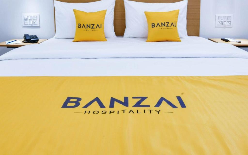 Postel nebo postele na pokoji v ubytování BANZAI ROOMS