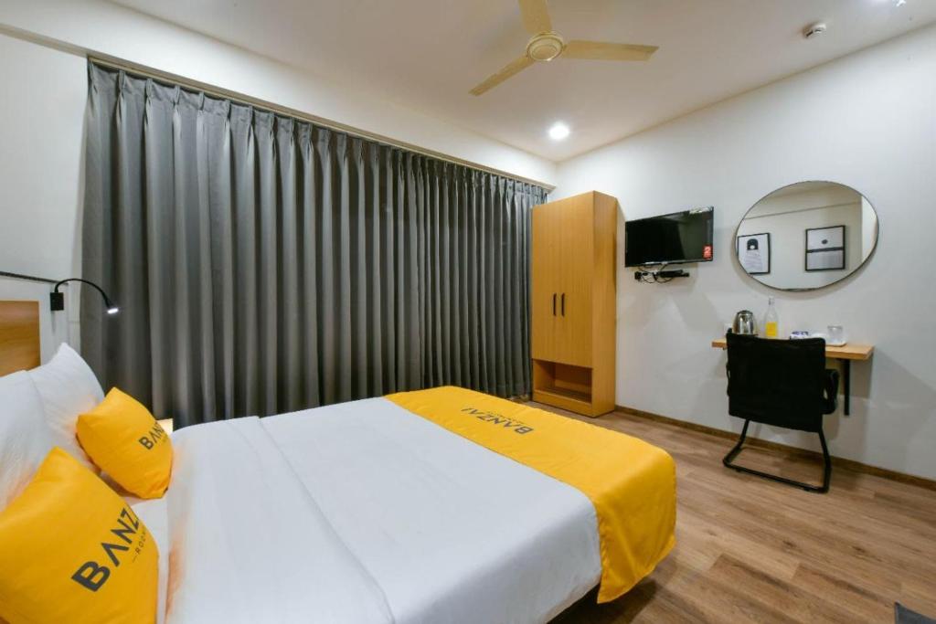 Postel nebo postele na pokoji v ubytování BANZAI ROOMS
