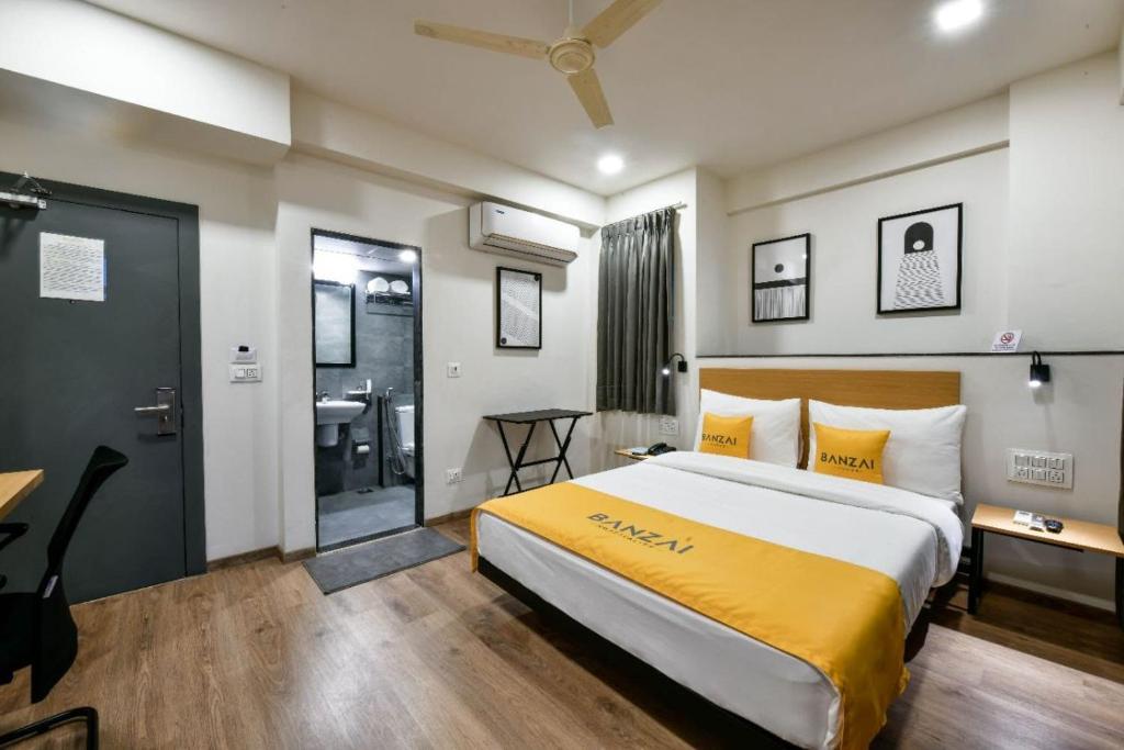 Postel nebo postele na pokoji v ubytování BANZAI ROOMS