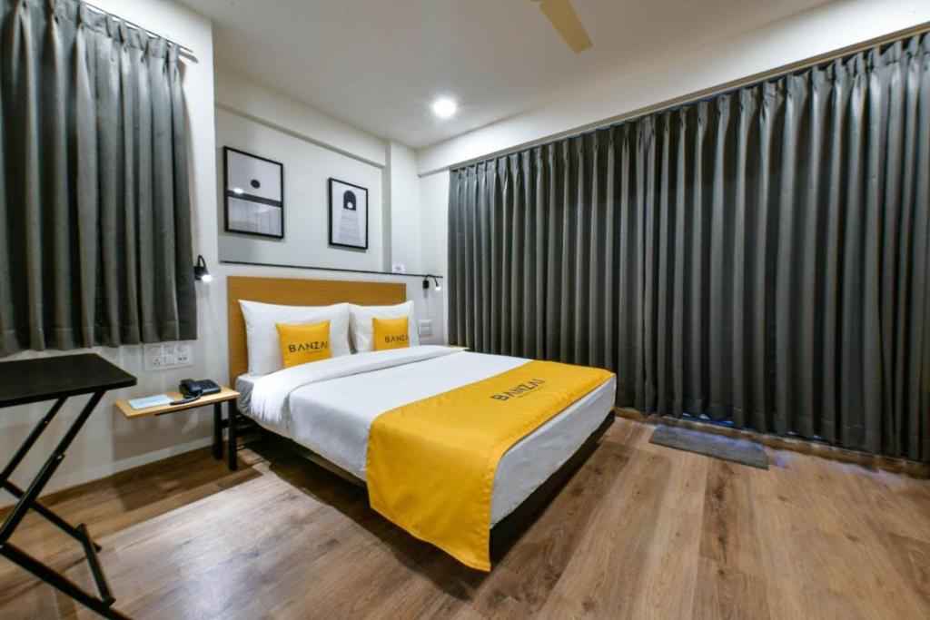 Postel nebo postele na pokoji v ubytování BANZAI ROOMS
