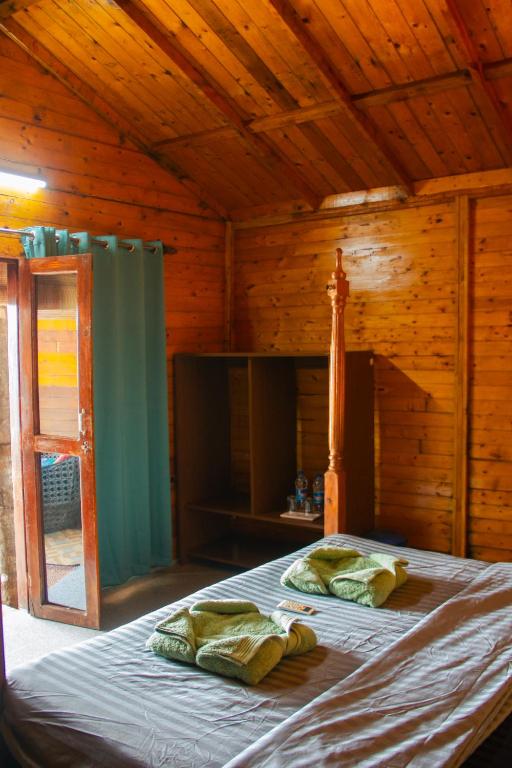Una cama o camas en una habitación de O3 Beach Resort