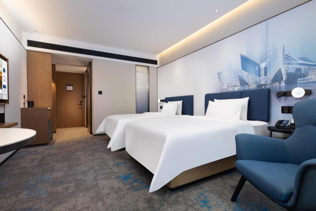Posezení v ubytování Hampton by Hilton Guangzhou Xintang