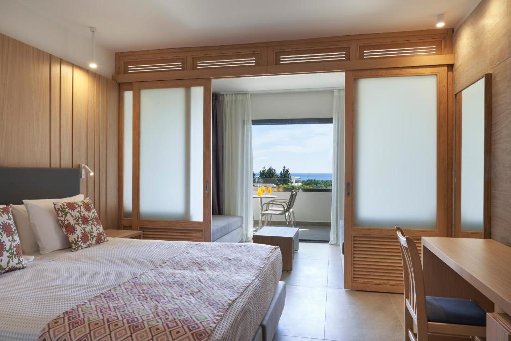Postel nebo postele na pokoji v ubytování Atlantica Mikri Poli Rhodes