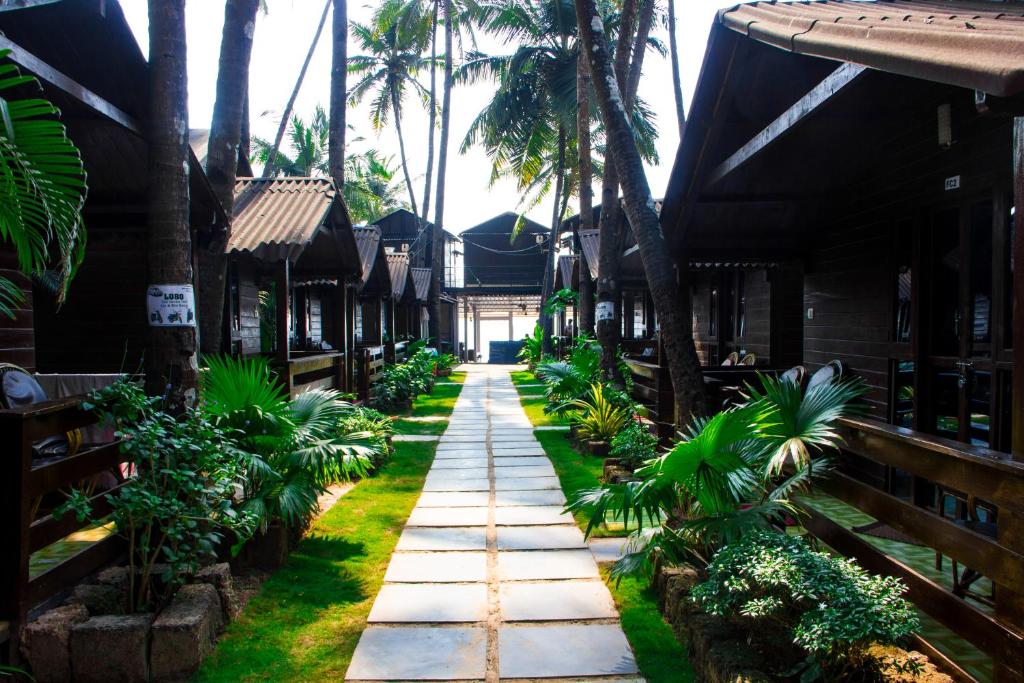 Un jardín fuera de O3 Beach Resort