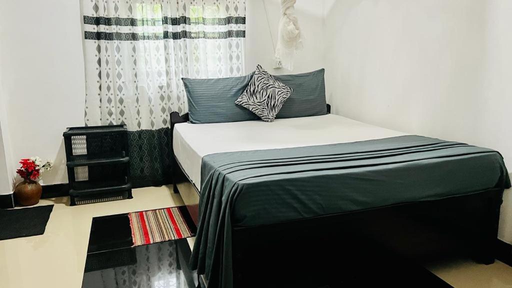 Postel nebo postele na pokoji v ubytování Village feel home stay