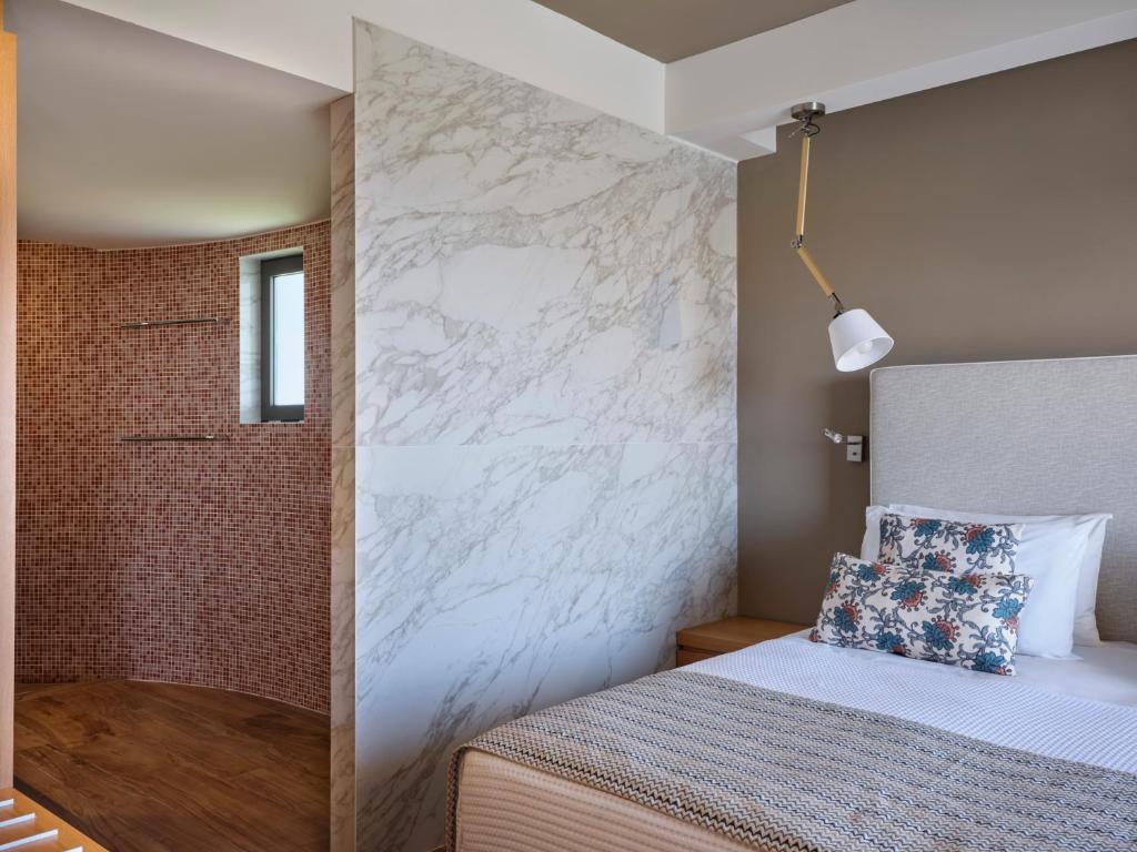 Postel nebo postele na pokoji v ubytování Atlantica Mikri Poli Rhodes