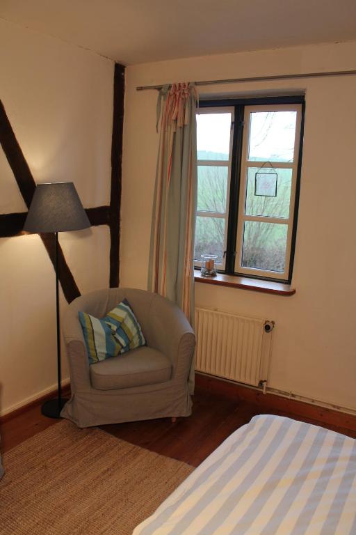 Postel nebo postele na pokoji v ubytování Das Abendrote Haus