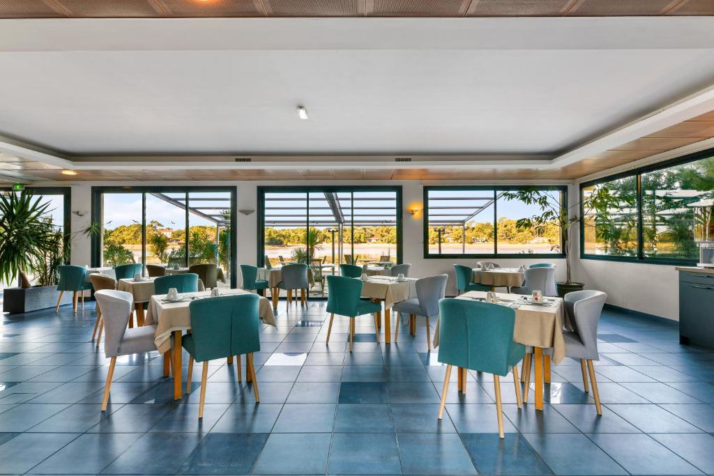 Posezení v ubytování Hotel Le Pavillon Bleu