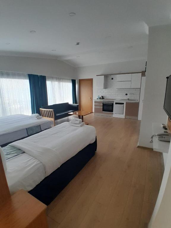 Ліжко або ліжка в номері Del Puerto Hotel