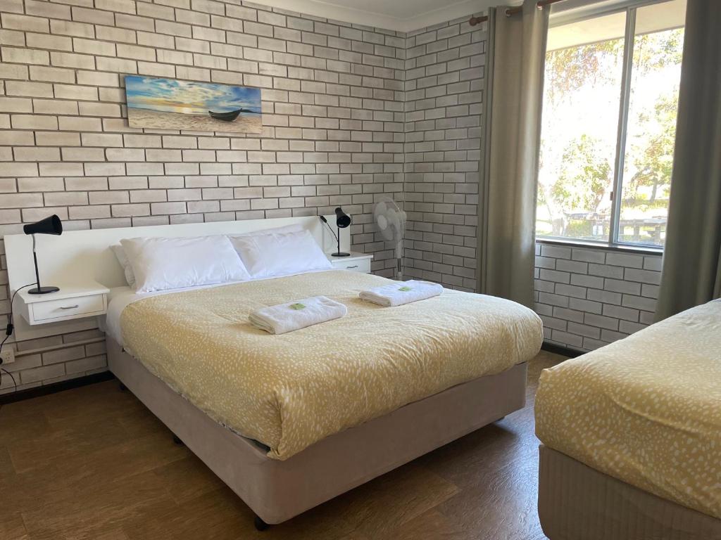 Postel nebo postele na pokoji v ubytování Augusta Escape Holiday Units