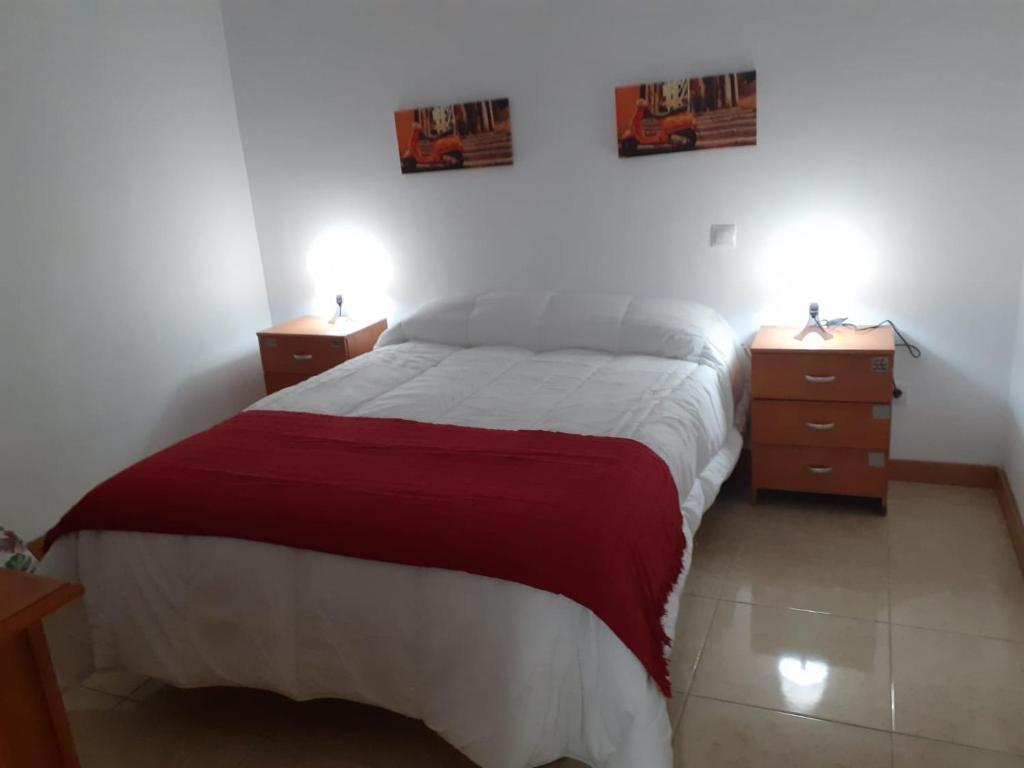 Кровать или кровати в номере Talavera Apartament